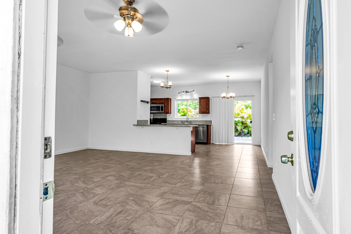 15-1136 Ama U Road Keaau, HI 96749 - Photo 10 of 25 a view of a kitchen with a sink and cabinets