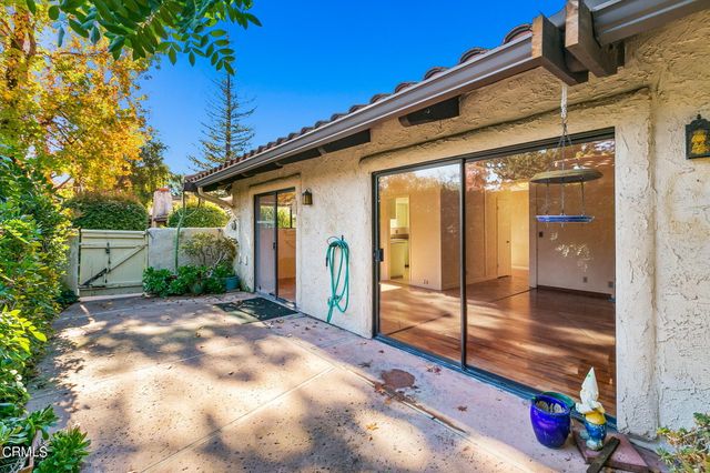 a view of backyard with cabin