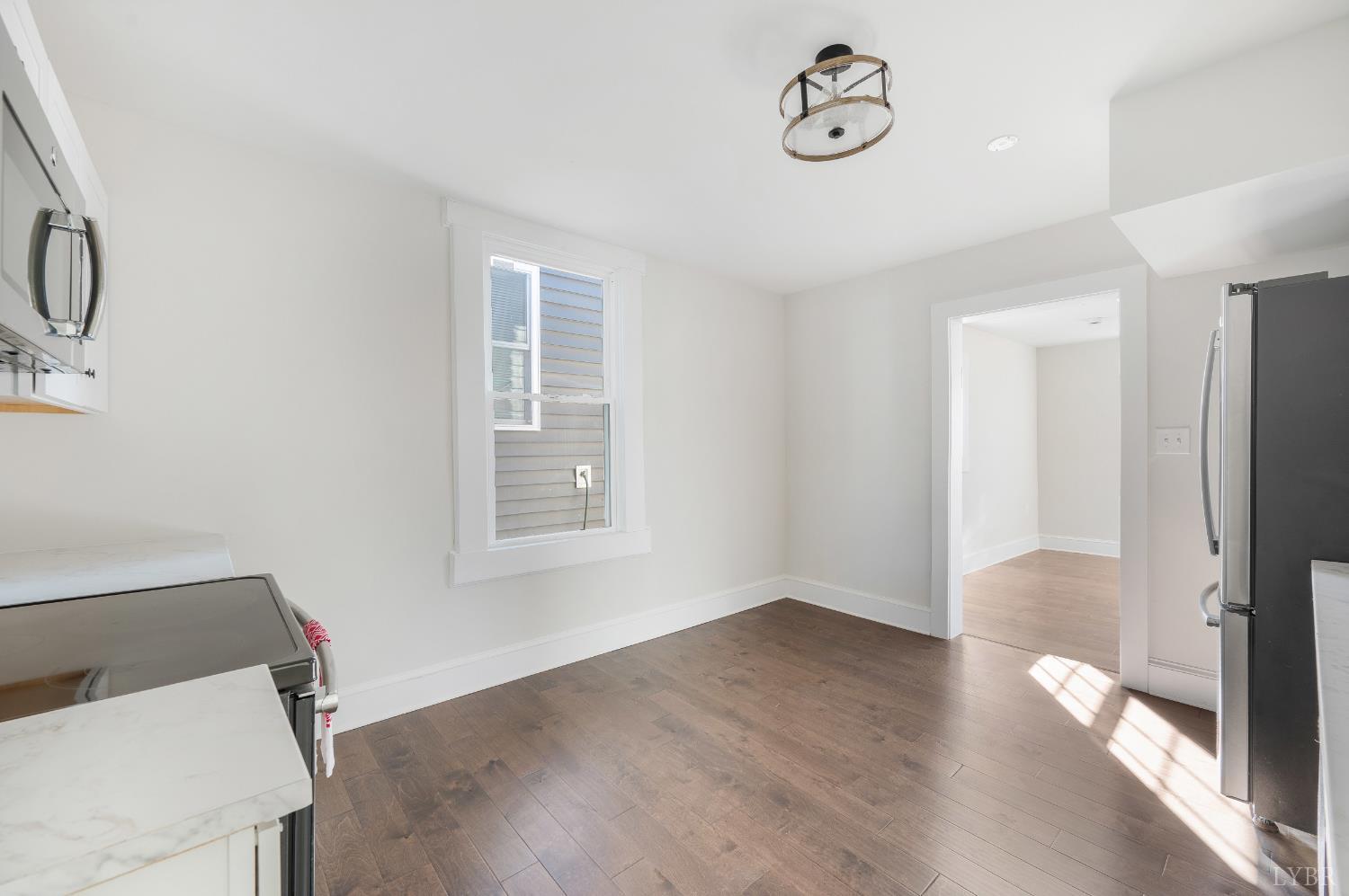 2927 Langhorne Road Lynchburg, VA 24501 - Photo 17 of 48 a view of a room with wooden floor and windows