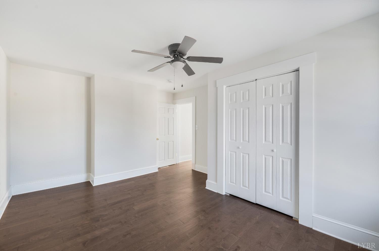 2927 Langhorne Road Lynchburg, VA 24501 - Photo 23 of 48 a view of a room with wooden floor and ceiling fan