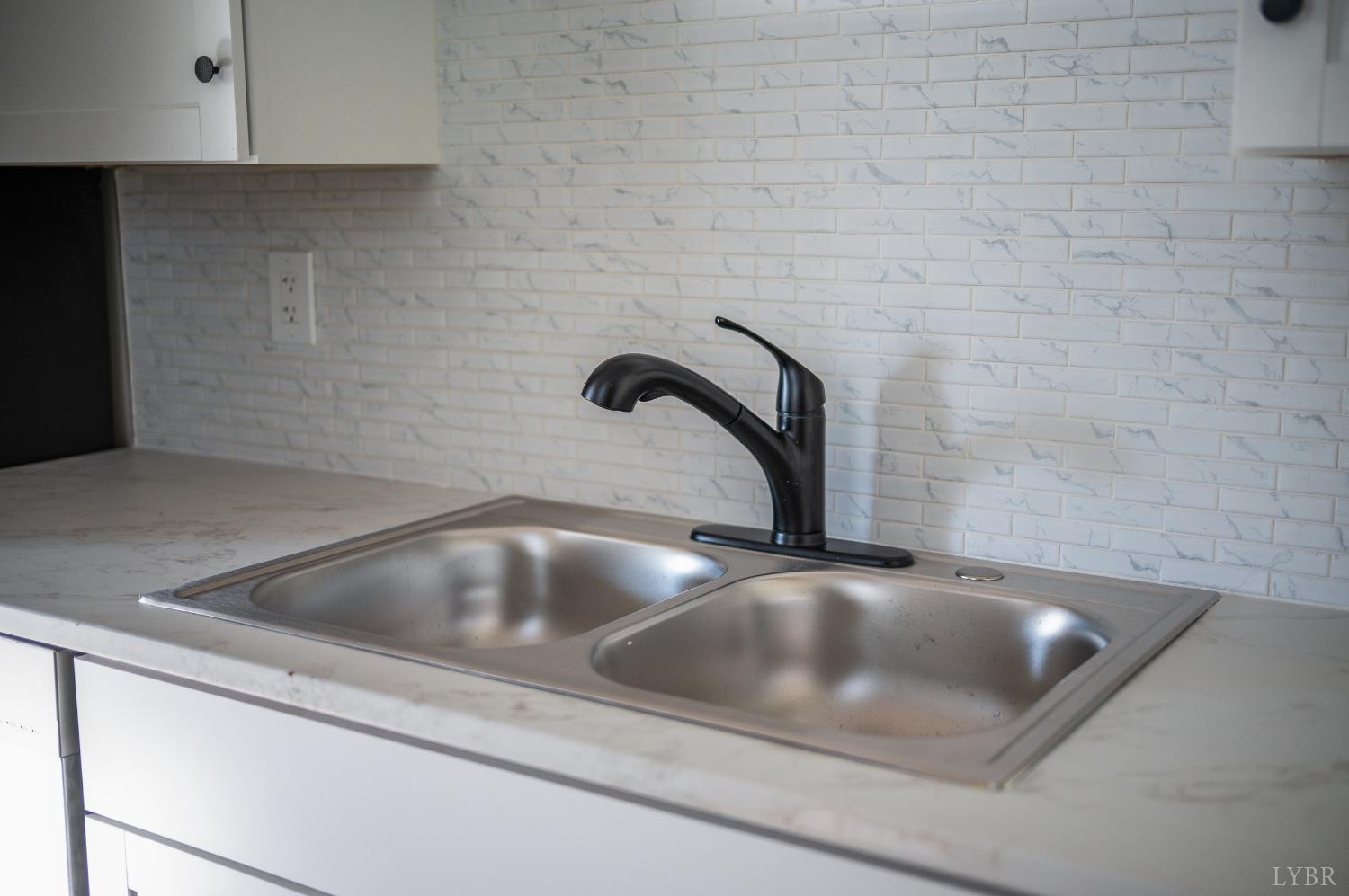 2927 Langhorne Road Lynchburg, VA 24501 - Photo 31 of 48 a close view of sink and tap