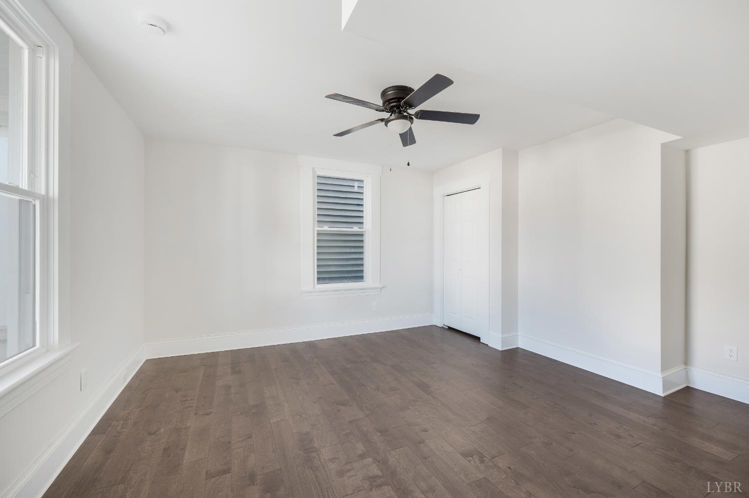 2927 Langhorne Road Lynchburg, VA 24501 - Photo 5 of 48 a view of empty room with wooden floor and fan