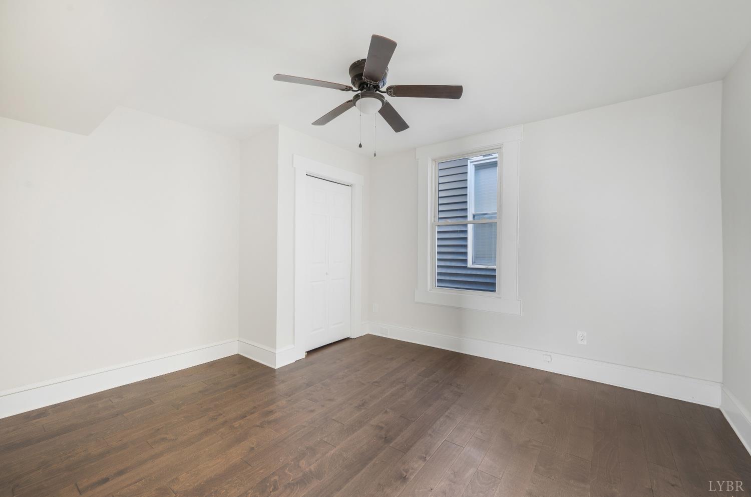 2927 Langhorne Road Lynchburg, VA 24501 - Photo 8 of 48 a view of empty room with wooden floor and ceiling fan