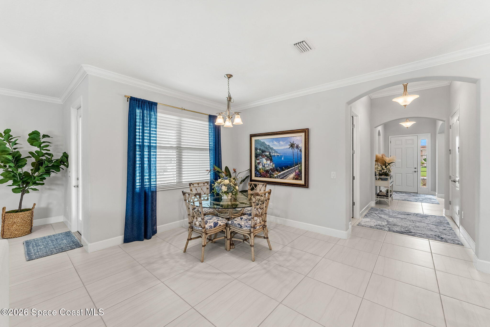 3135 Addison Drive Melbourne, FL 32940 - Photo 11 of 51 a workspace with furniture and a potted plant