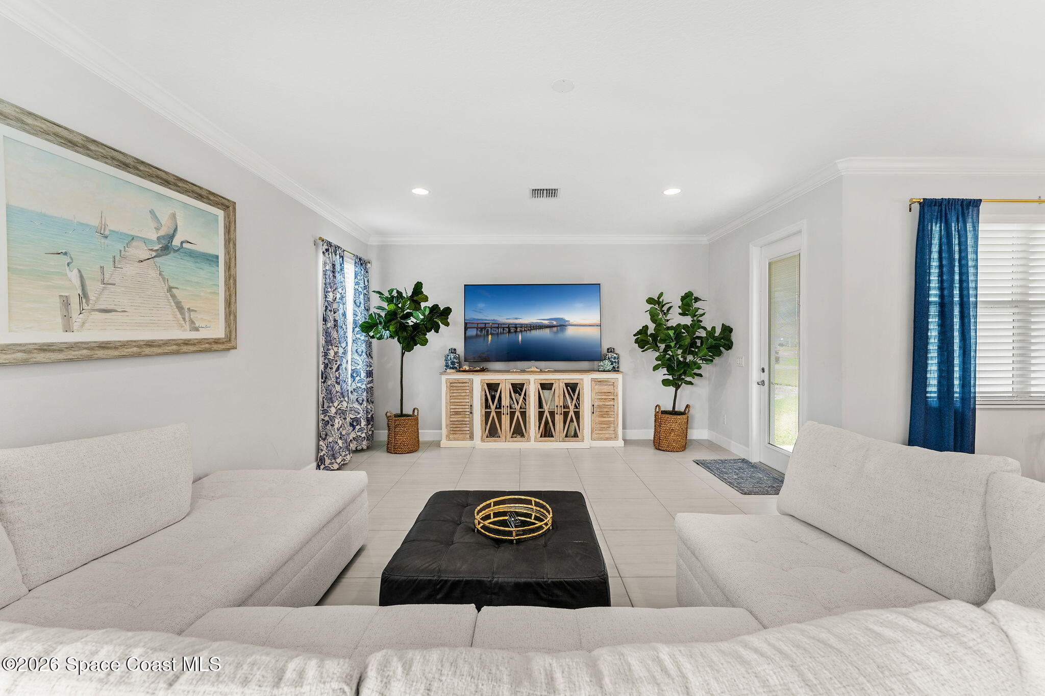 3135 Addison Drive Melbourne, FL 32940 - Photo 14 of 51 a view of a livingroom with furniture and window