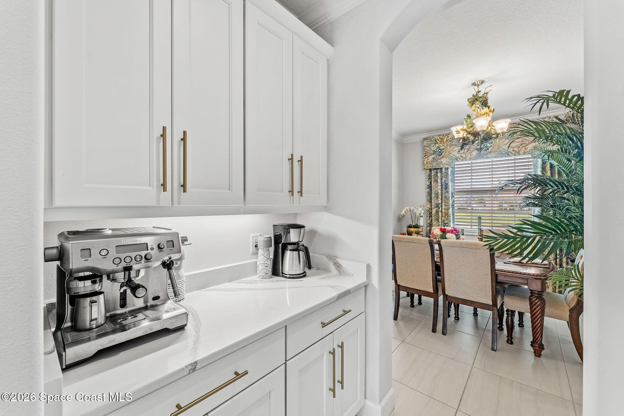 3135 Addison Drive Melbourne, FL 32940 - Photo 15 of 51 a kitchen with appliances and cabinets