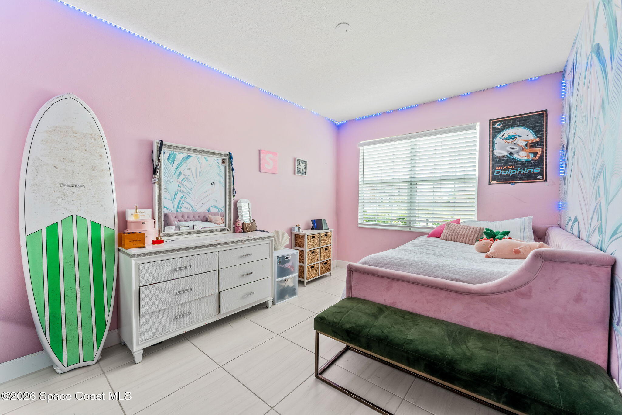 3135 Addison Drive Melbourne, FL 32940 - Photo 22 of 51 a bedroom with a bed and window