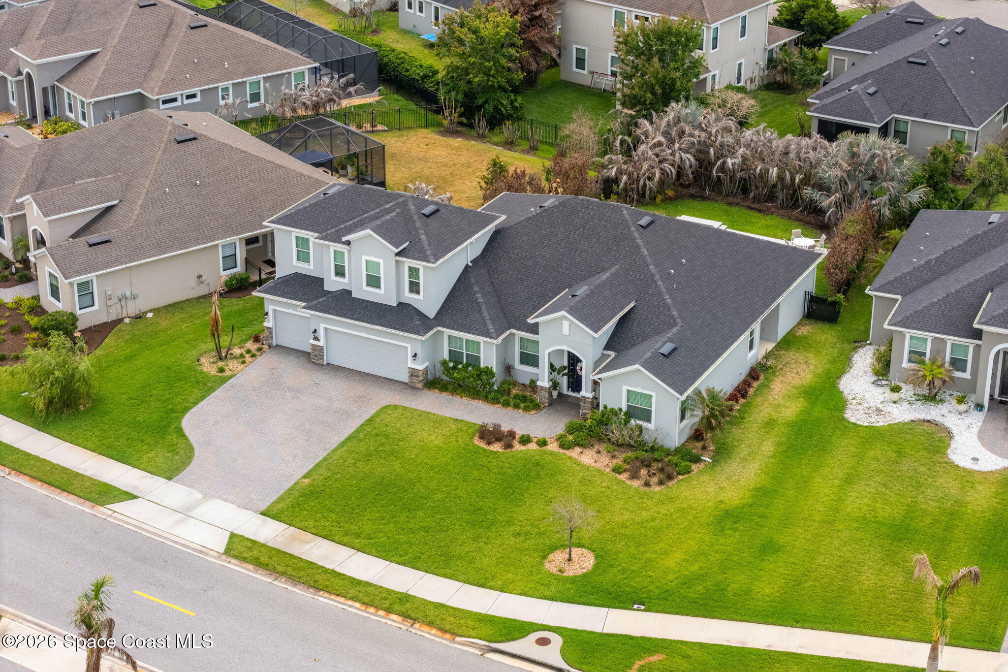 3135 Addison Drive Melbourne, FL 32940 - Photo 35 of 51 an aerial view of residential houses with yard