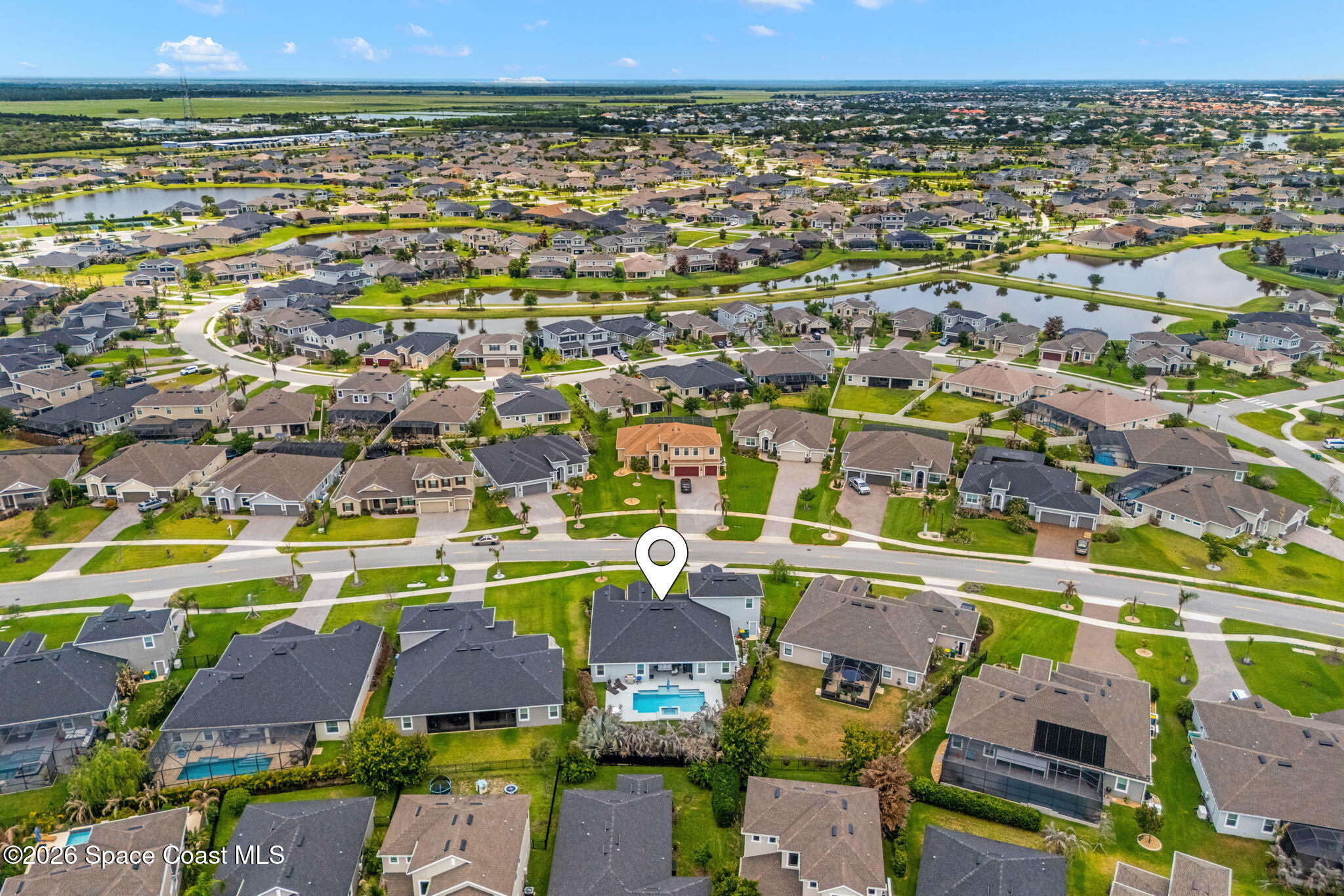 3135 Addison Drive Melbourne, FL 32940 - Photo 40 of 51 an aerial view of residential houses with outdoor space and swimming pool