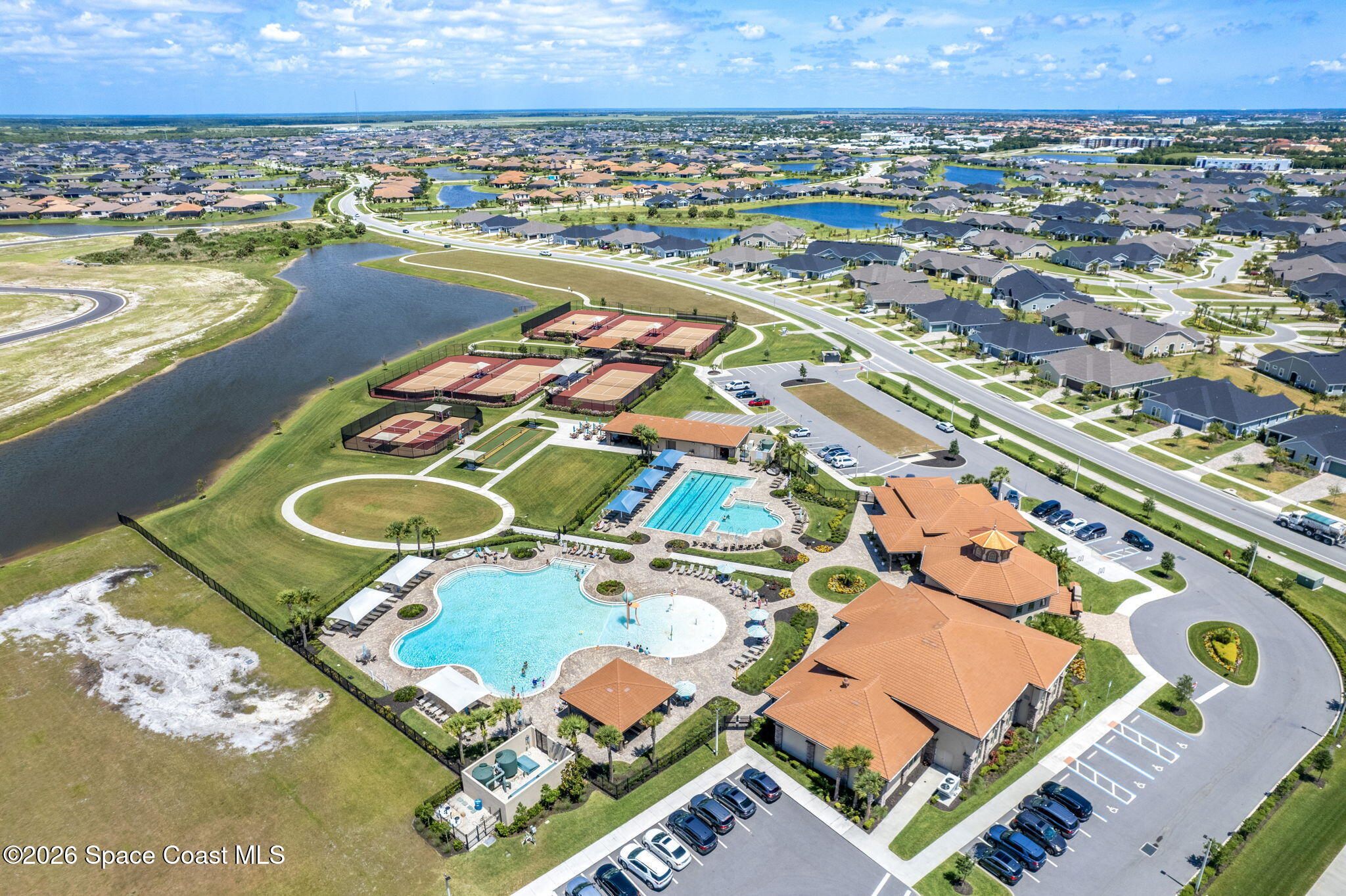 3135 Addison Drive Melbourne, FL 32940 - Photo 45 of 51 an aerial view of residential houses with outdoor space