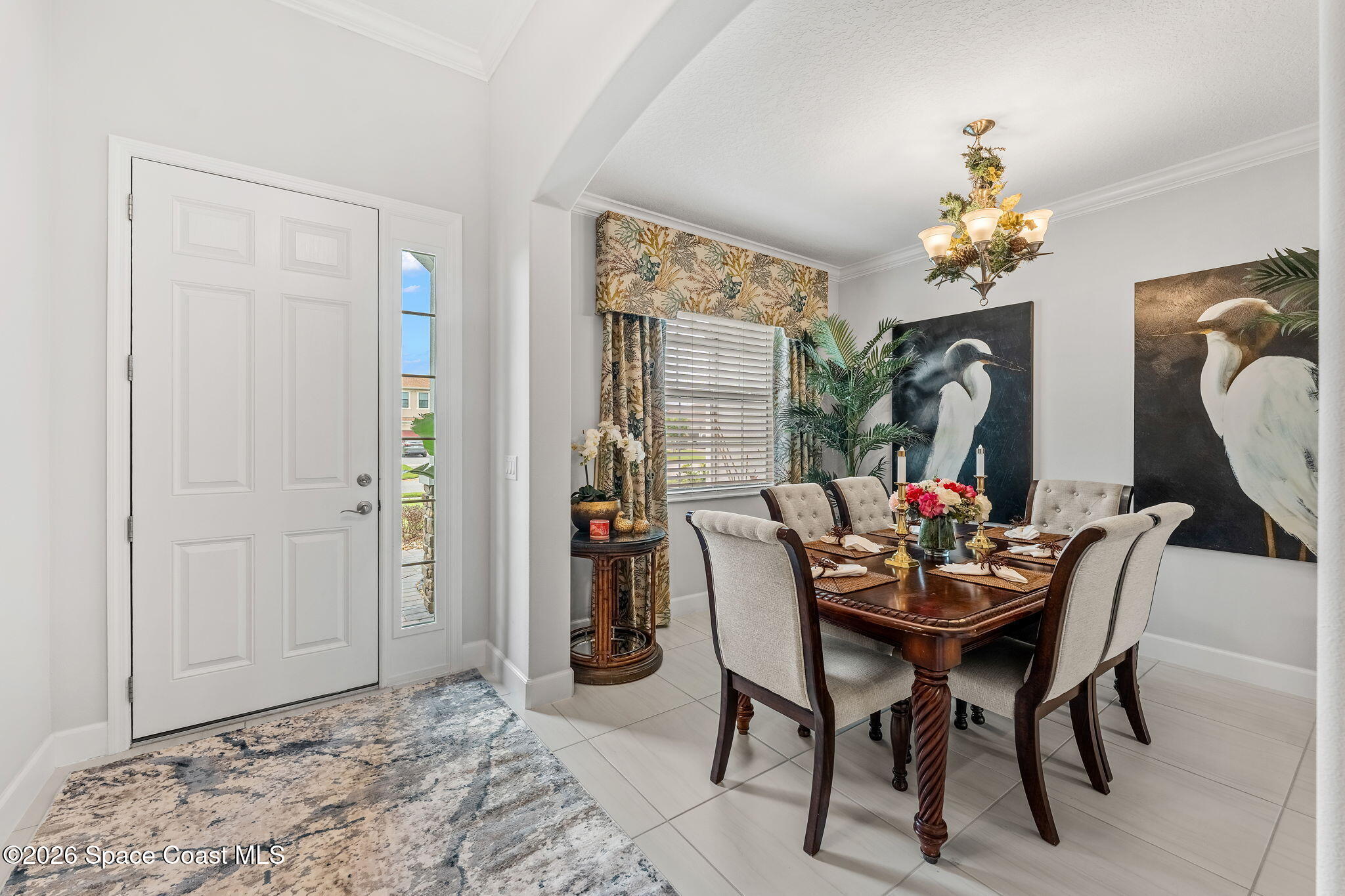 3135 Addison Drive Melbourne, FL 32940 - Photo 5 of 51 a dining room with furniture and window