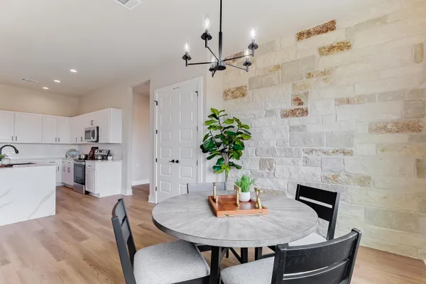 a living room with furniture and a table