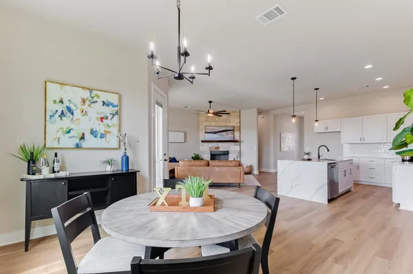 a view of a dining room with furniture