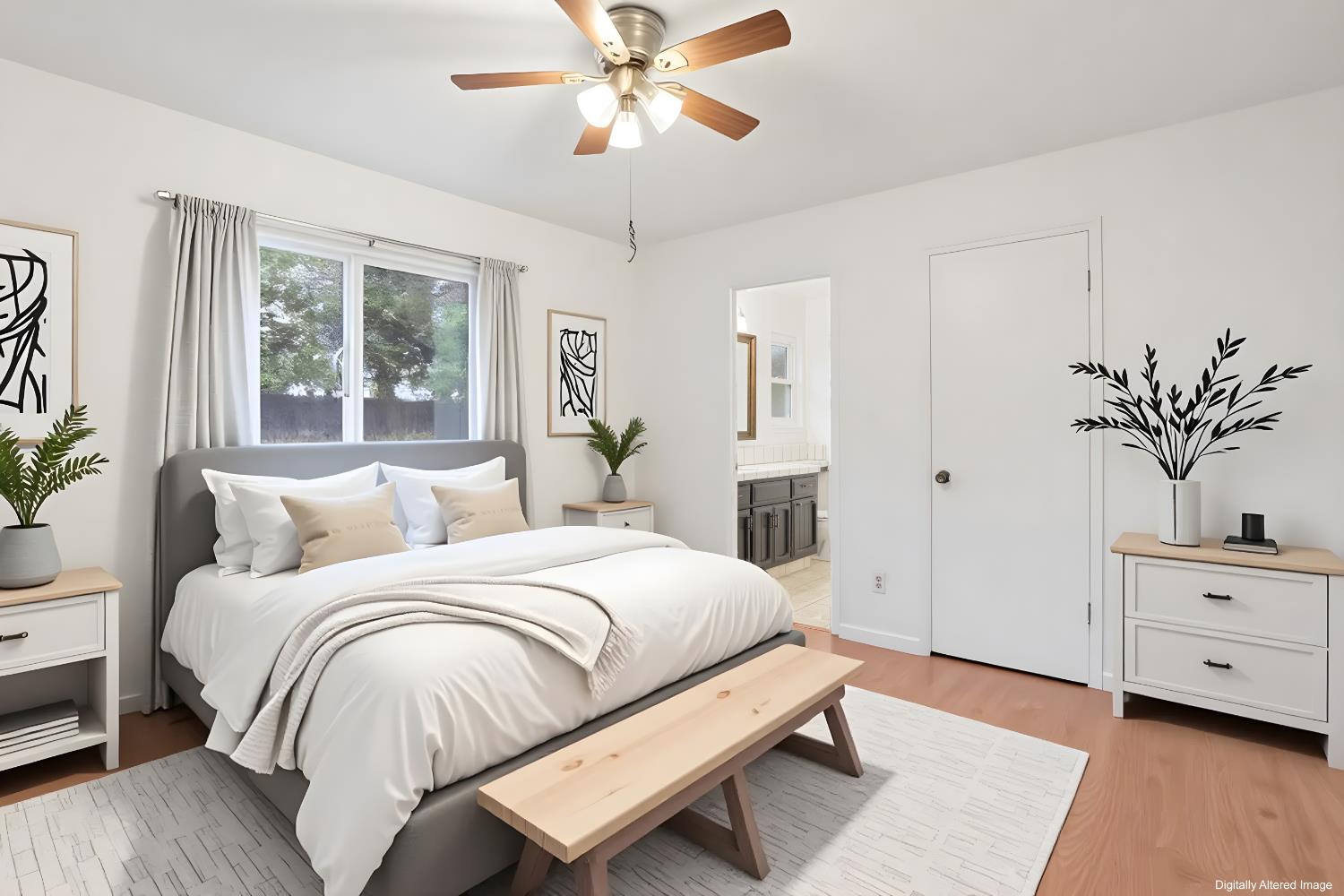 1417 Fransen Lane Modesto, CA 95355 - Photo 18 of 30 a bedroom with a large bed and a chandelier