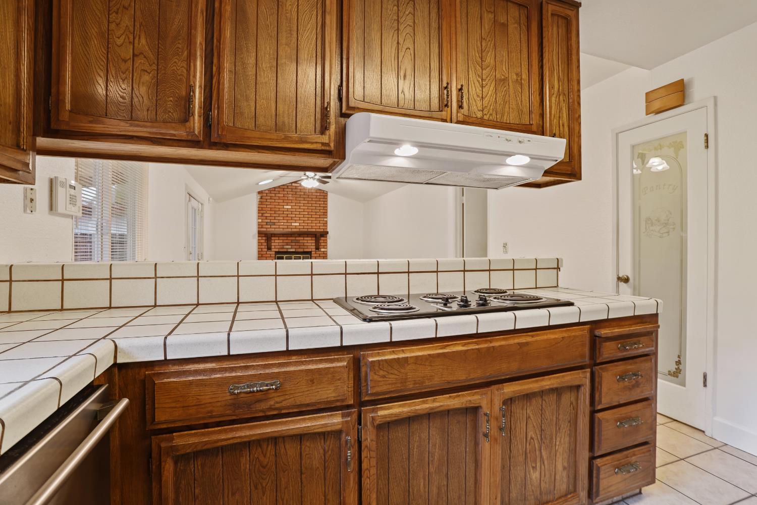 1417 Fransen Lane Modesto, CA 95355 - Photo 7 of 30 a kitchen with a sink and cabinets