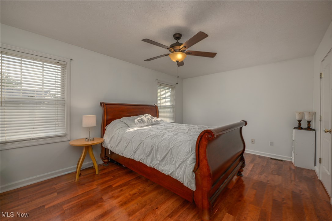 6986 Sweetwater Road Northeast Canton, OH 44721 - Photo 15 of 36 Bedroom with hardwood / wood-style floors and ceiling fan