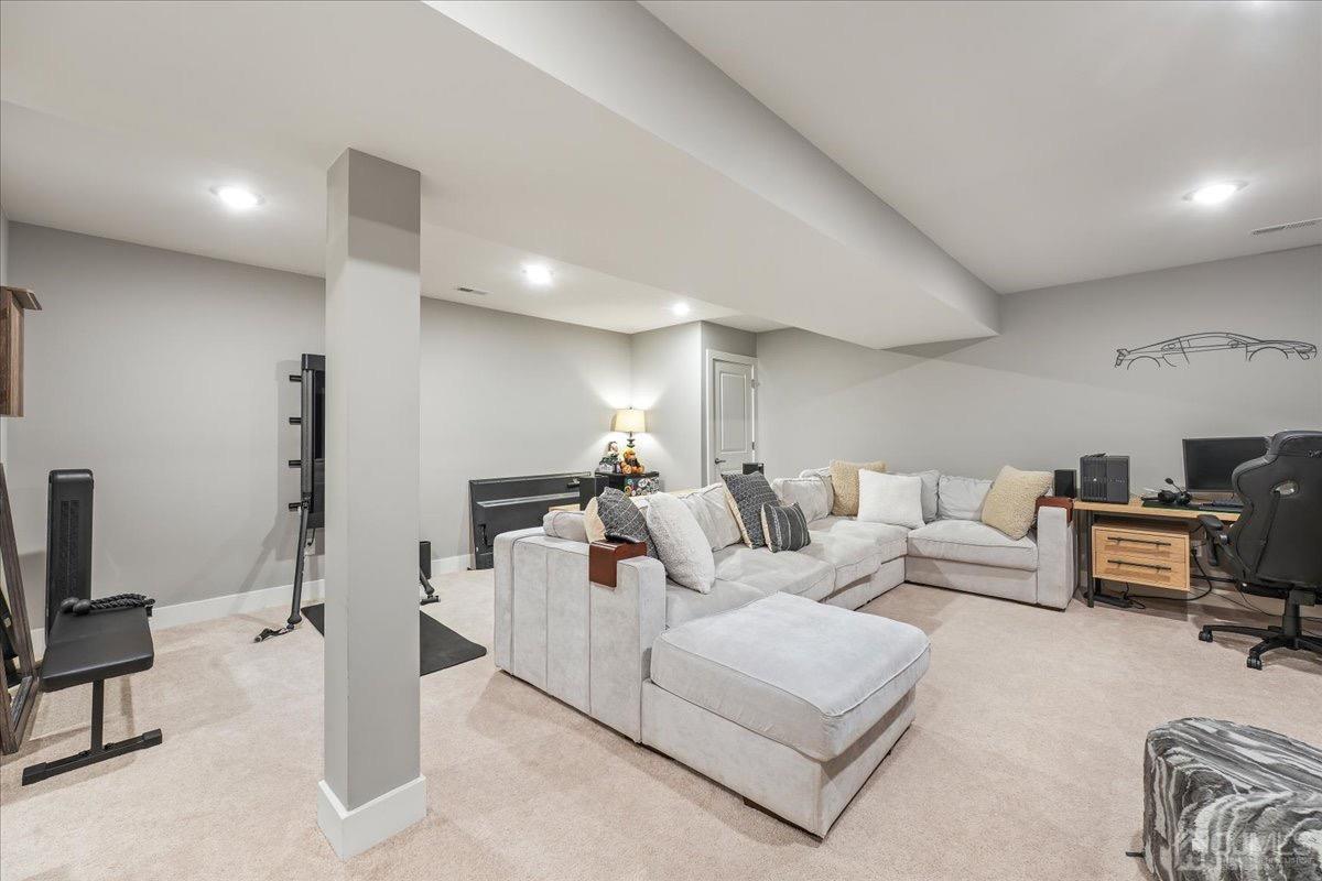 1404 Tavern Road Monroe Township, NJ 08831 - Photo 24 of 29 a living room with furniture and a flat screen tv
