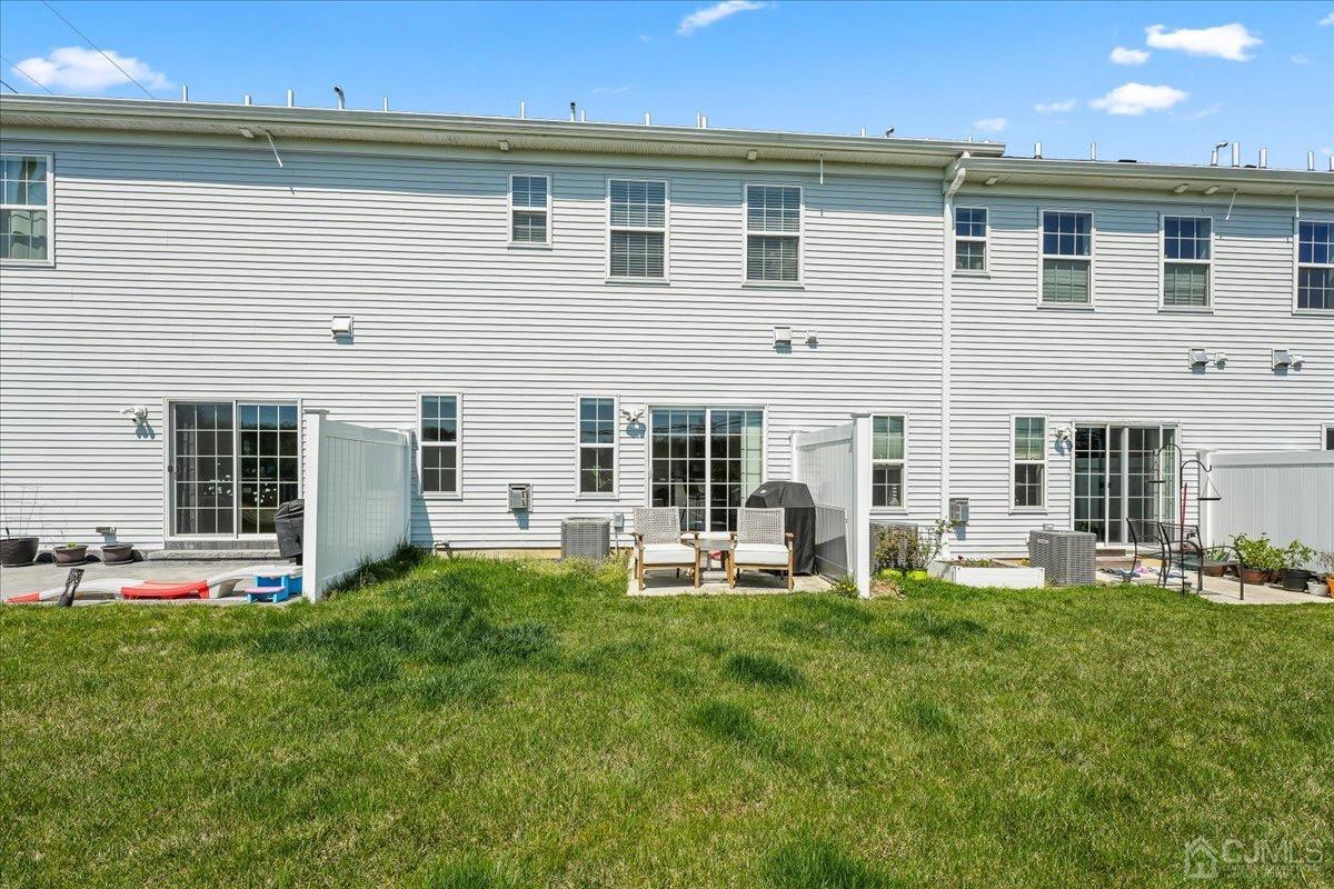1404 Tavern Road Monroe Township, NJ 08831 - Photo 29 of 29 a front view of house with yard outdoor seating and yard