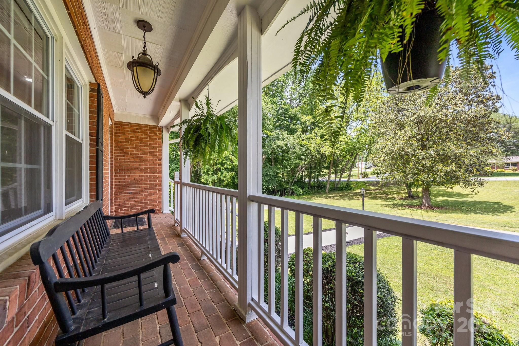 2076 Junction Road Cooleemee, NC 27014 - Photo 4 of 44 a view of a porch with furniture