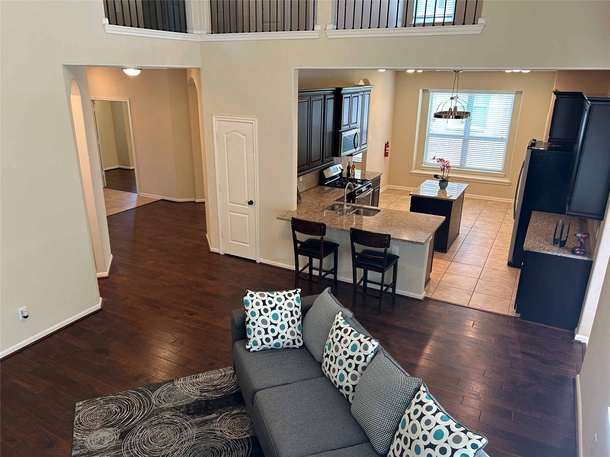 6819 Hunters Trace Lane Baytown, TX 77521 - Photo 9 of 32 a living room with furniture and a flat screen tv