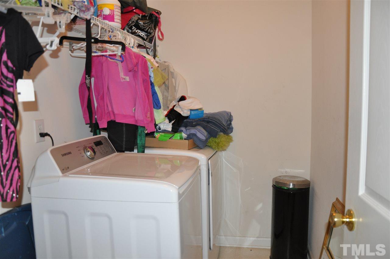 3305 Marcony Way Raleigh, NC 27610 - Photo 14 of 25 a utility room with dryer and washer