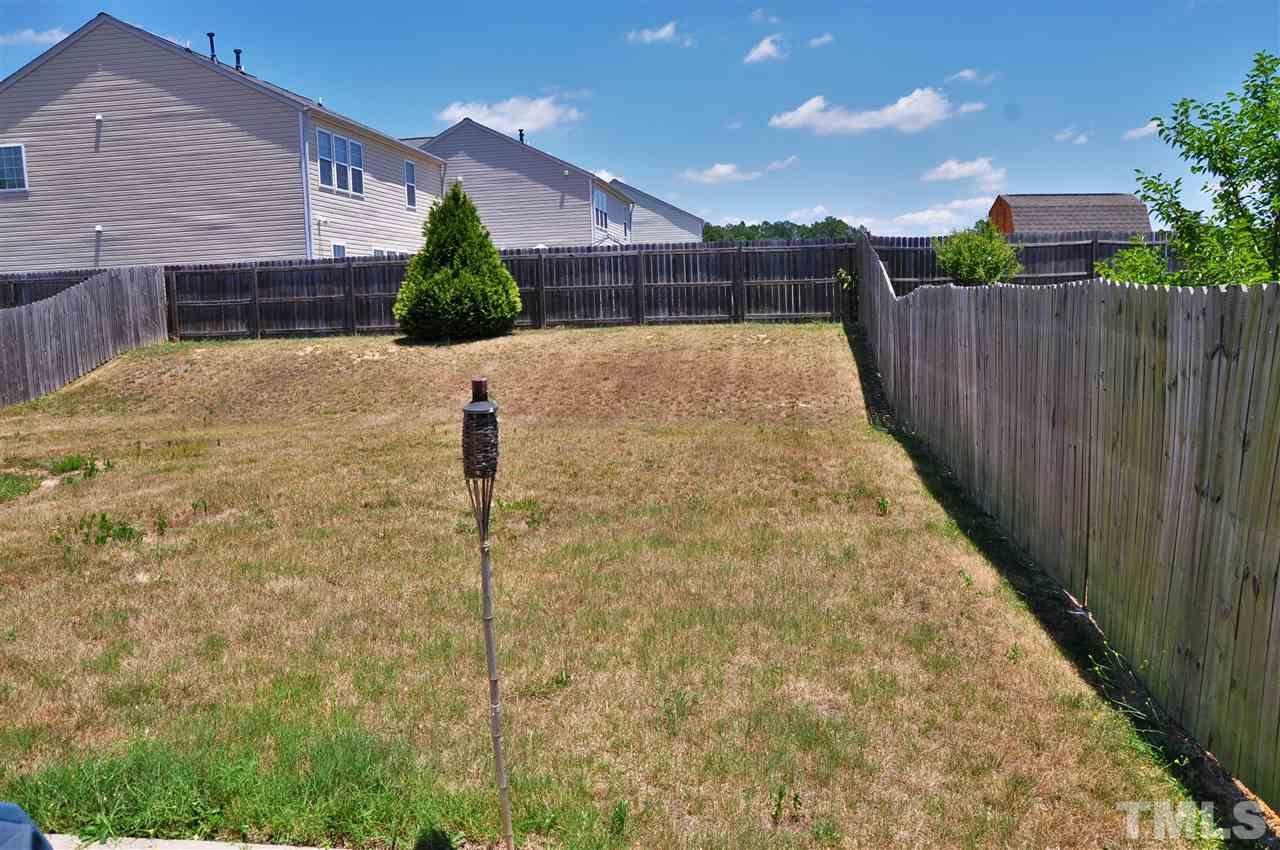 3305 Marcony Way Raleigh, NC 27610 - Photo 24 of 25 a view of a backyard