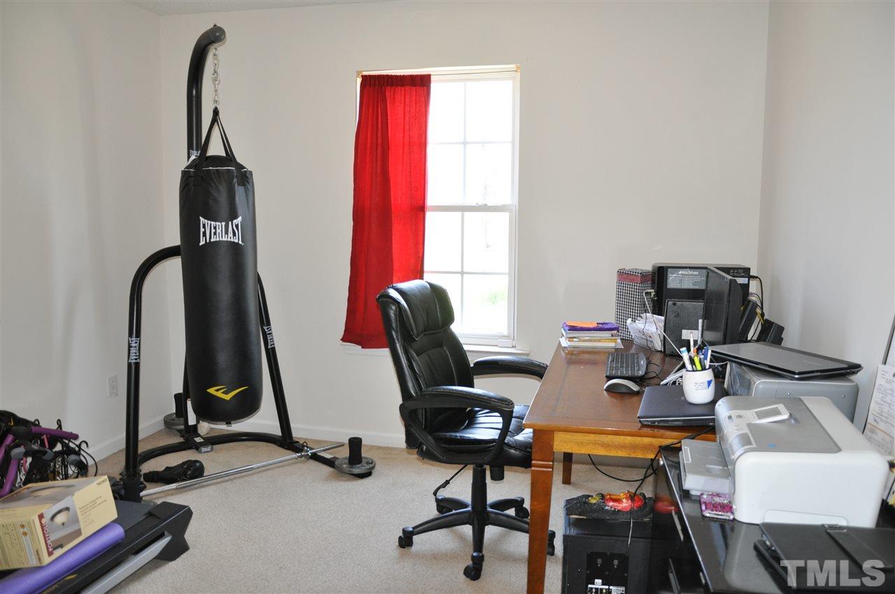 3305 Marcony Way Raleigh, NC 27610 - Photo 10 of 25 a view of a workspace with gym equipment