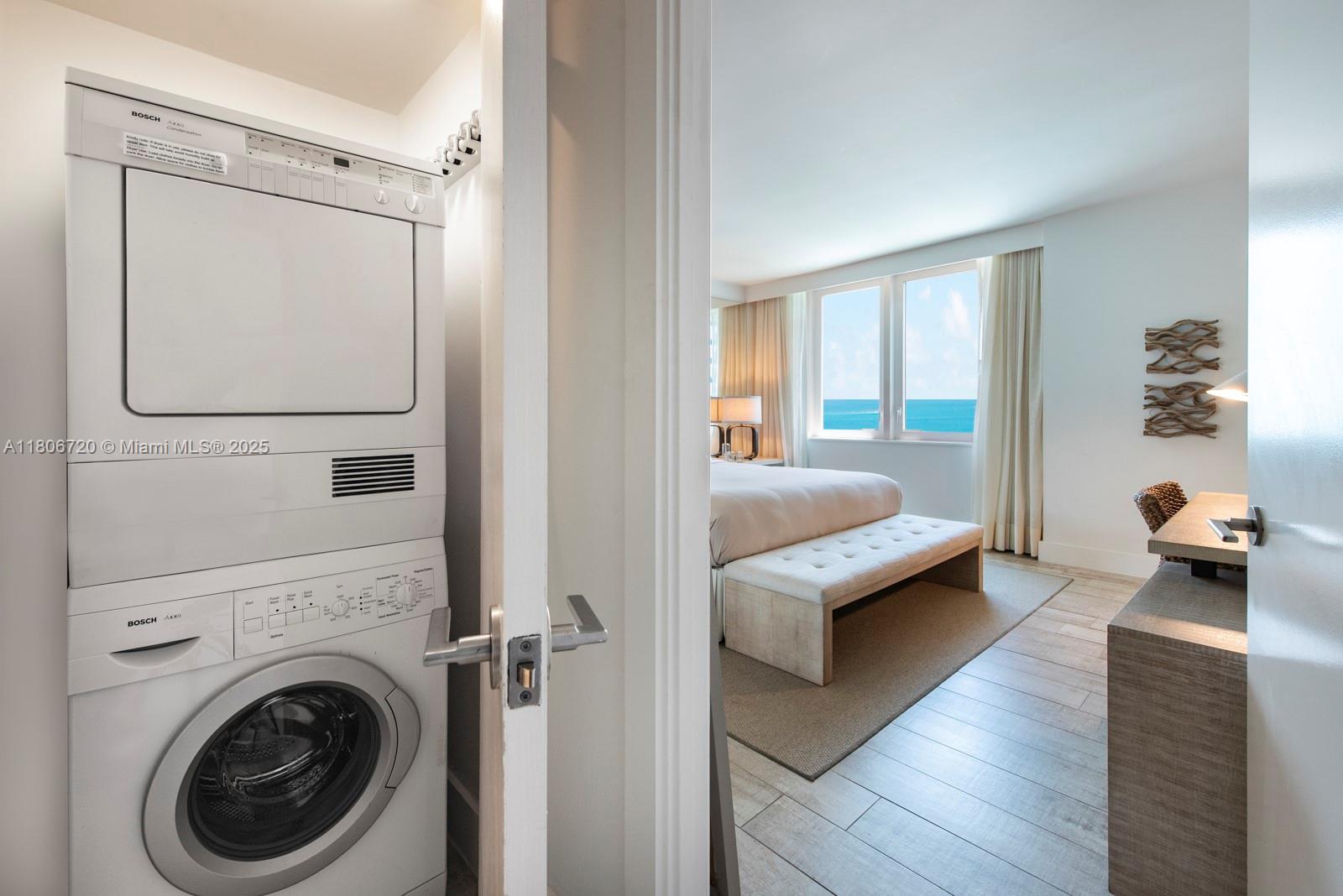 102 24th Street, Unit 1012 Miami Beach, FL 33139 - Photo 9 of 18 a view of living room washer and dryer