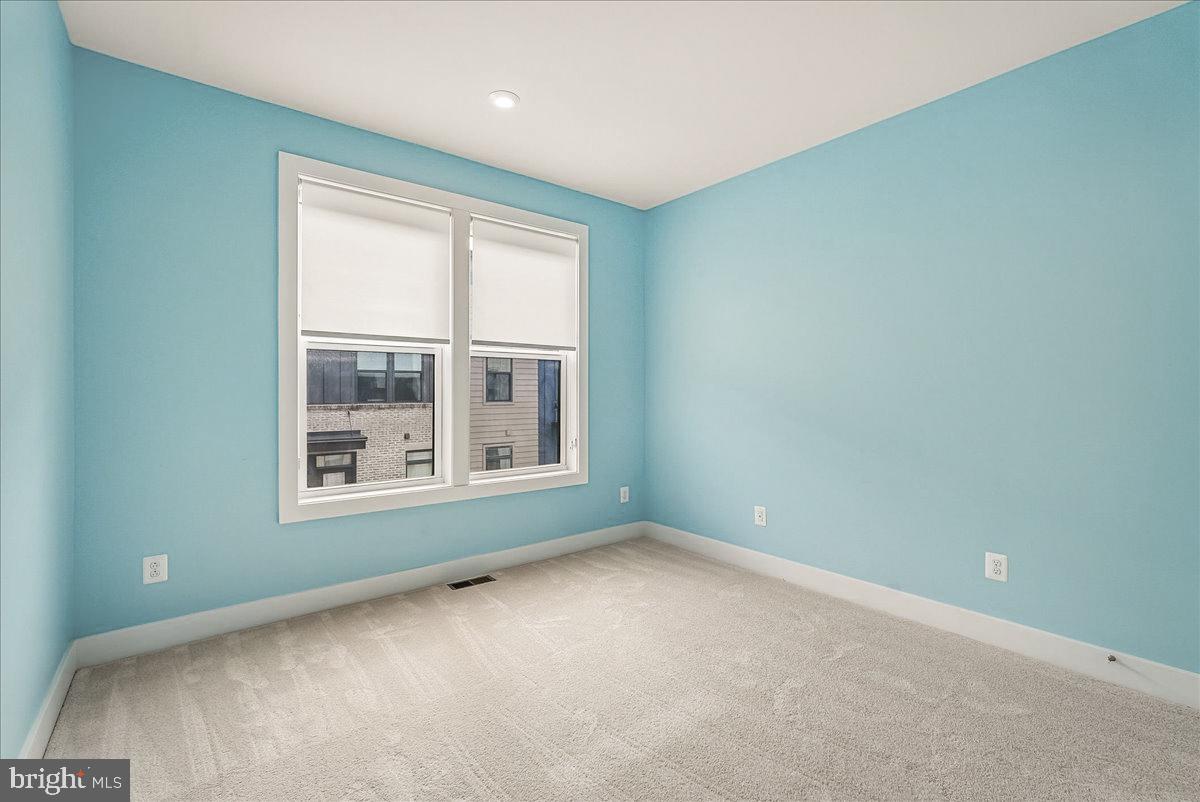 1658 Bandit Loop, Unit 2B Reston, VA 20190 - Photo 21 of 43 Bedroom #3 has recessed lighting & new carpet.