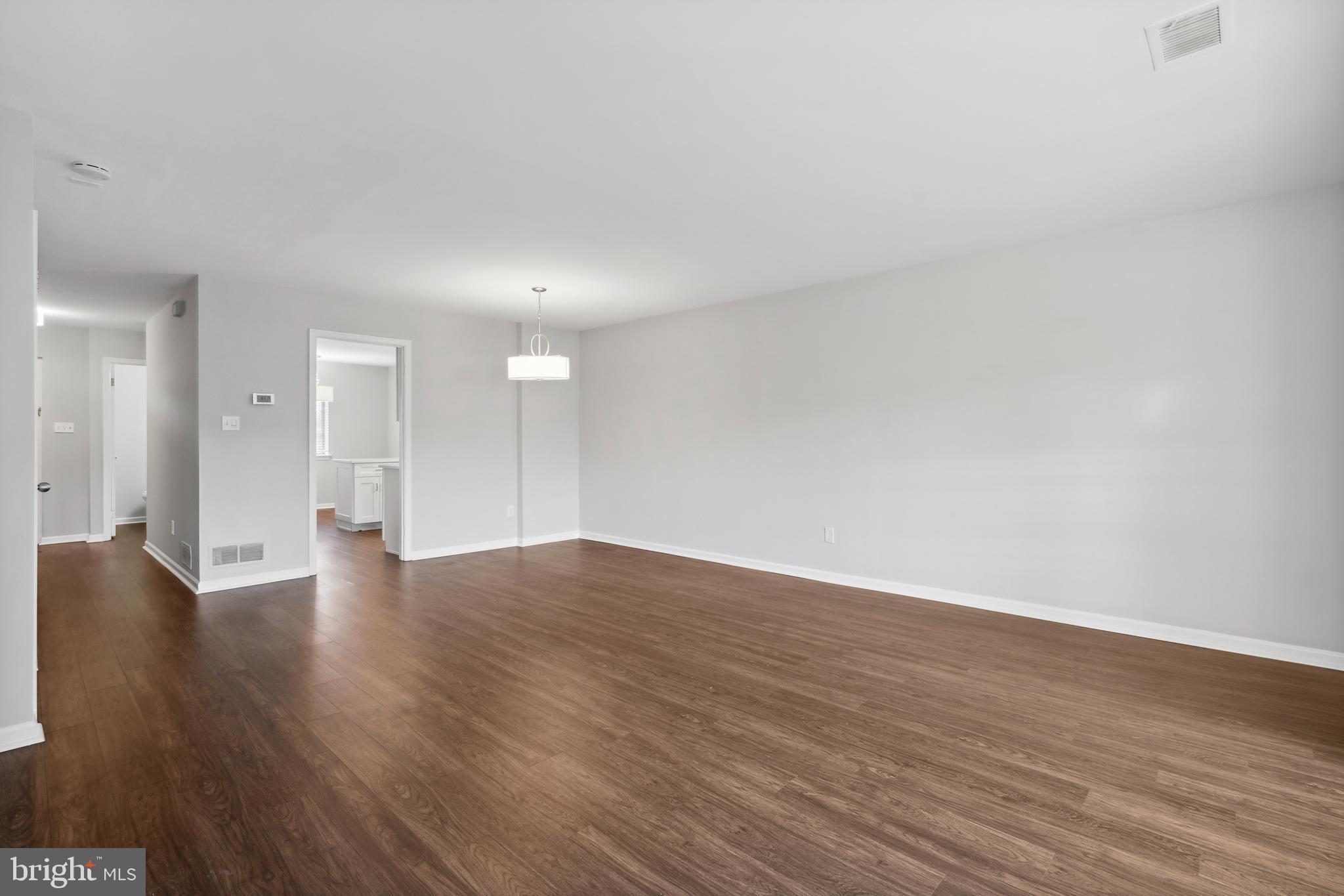 50 Woodside Road, Unit 4 Ardmore, PA 19003 - Photo 11 of 23 Living Room with Dining Area