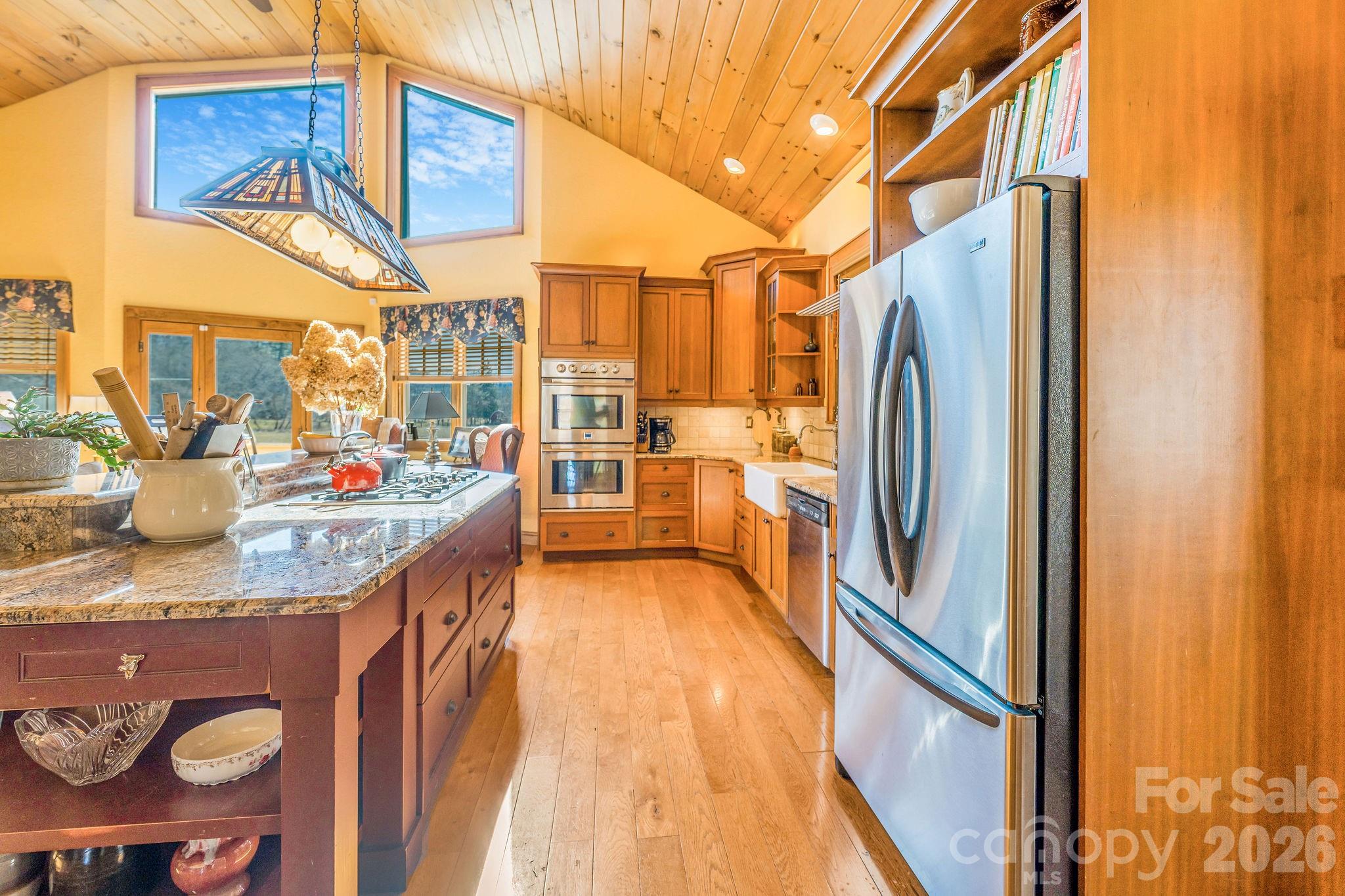 22 Mountain Spring Lane Canton, NC 28716 - Photo 13 of 48 a kitchen view with a sink and refrigerator