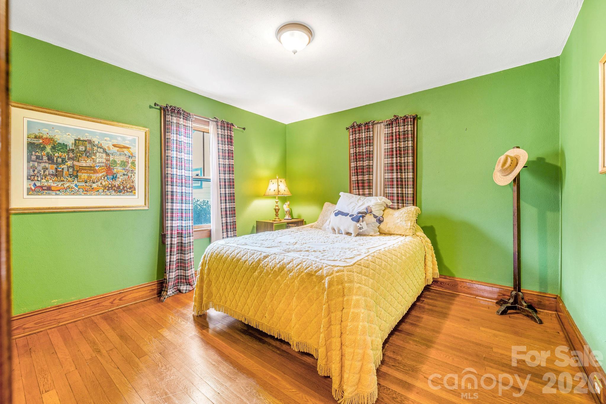 22 Mountain Spring Lane Canton, NC 28716 - Photo 31 of 48 a bedroom with a bed and a window