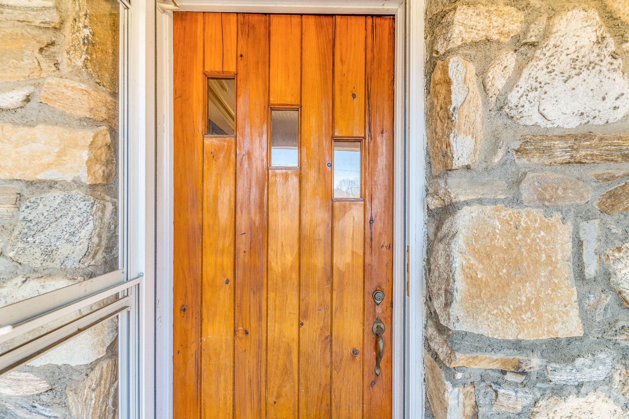 22 Mountain Spring Lane Canton, NC 28716 - Photo 42 of 48 a view of a door and chair