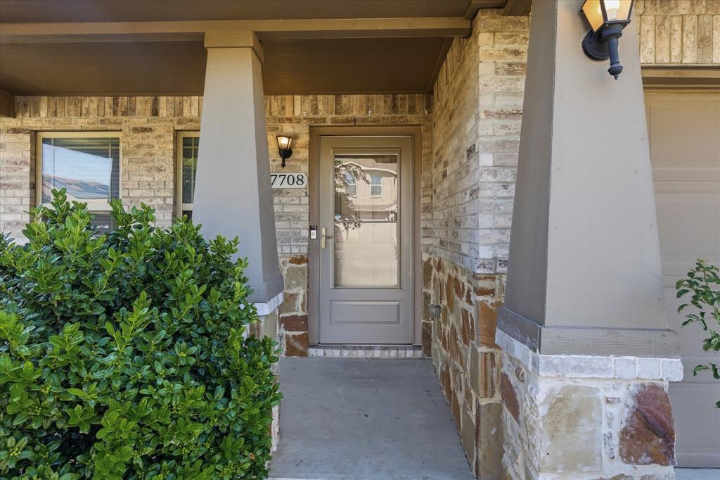 7708 Boat Wind Road Fort Worth, TX 76179 - Photo 1 of 23 Front Entry with Storm Door