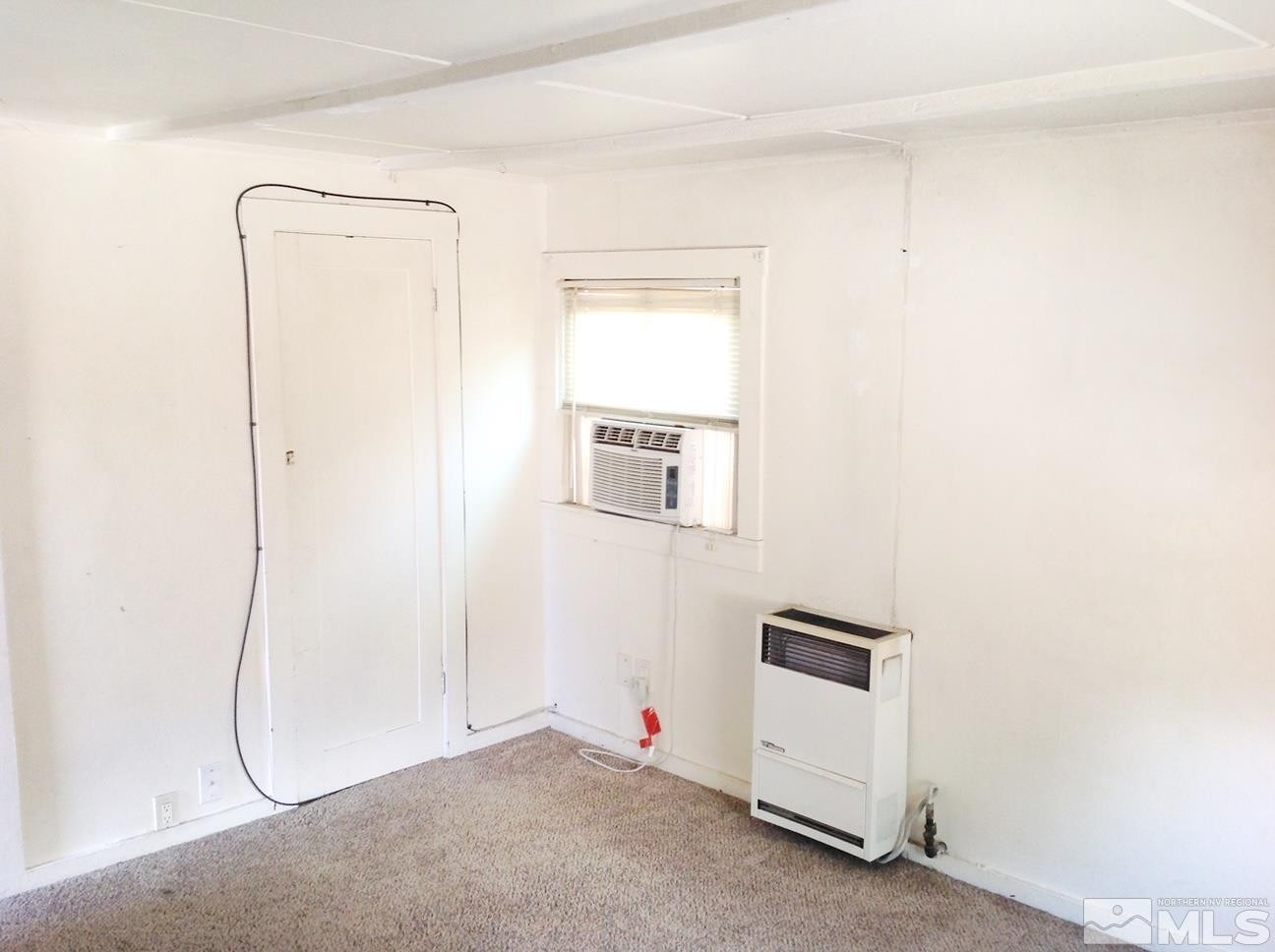 629 Sinclair Street Reno, NV 89501 - Photo 25 of 27 a room with a white door and a white door