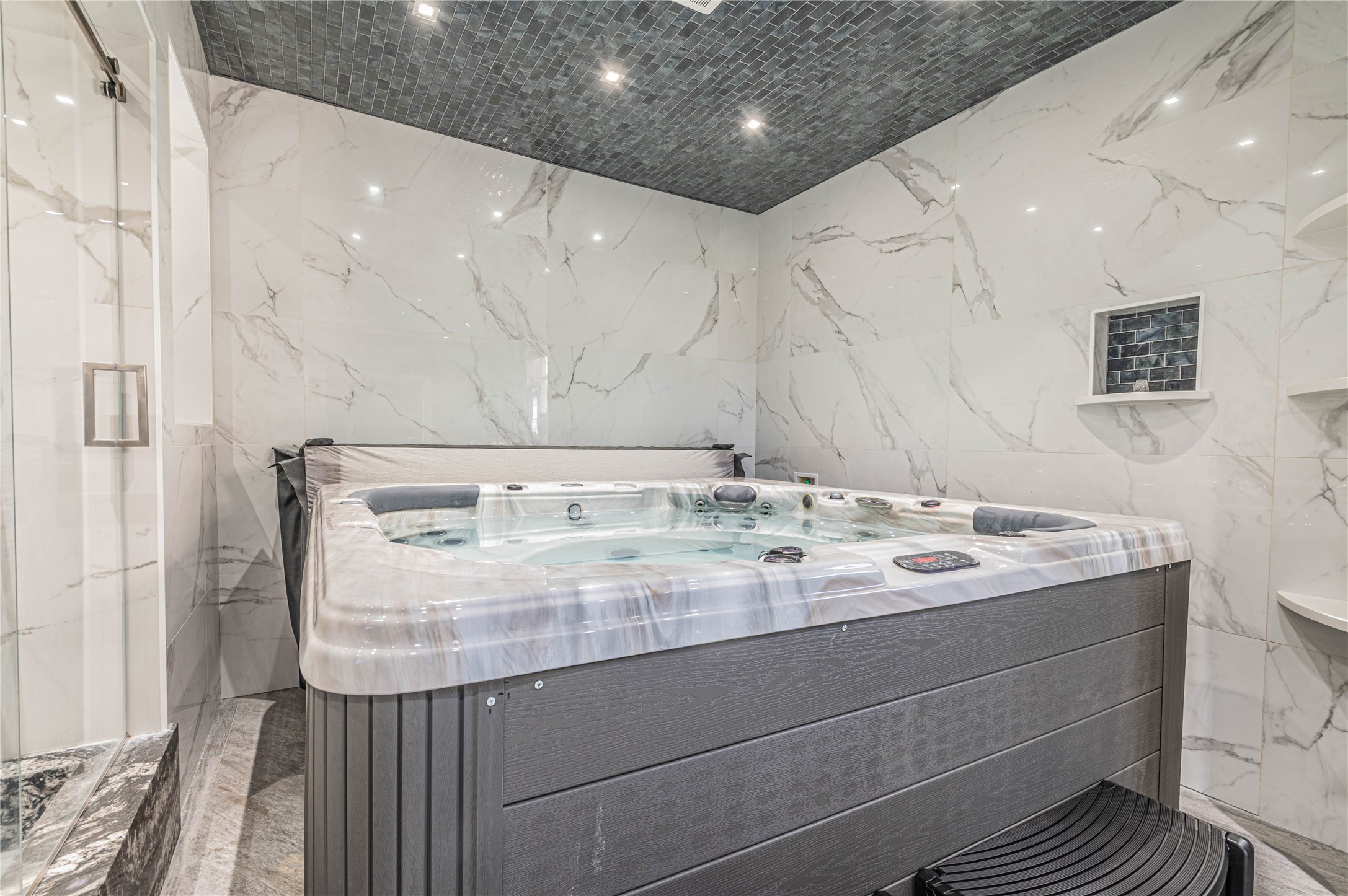 4702 Oasis Point Katy, TX 77493 - Photo 21 of 43 a bathroom with a granite countertop sink and a mirror