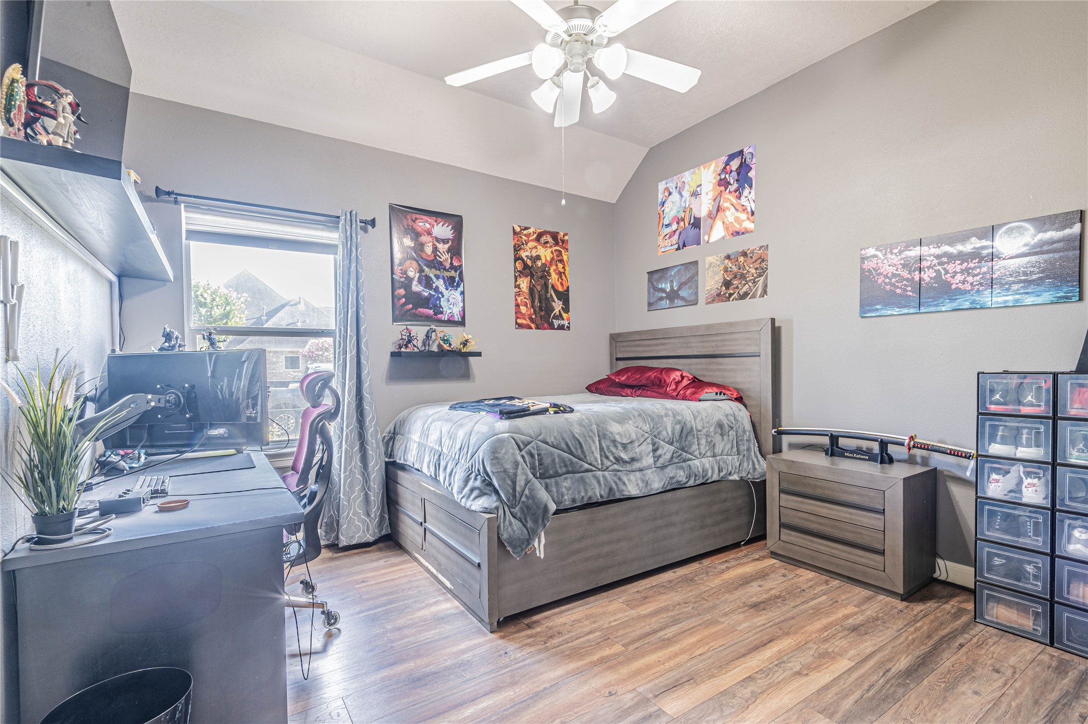 4702 Oasis Point Katy, TX 77493 - Photo 22 of 43 a bedroom with a bed and wooden floor