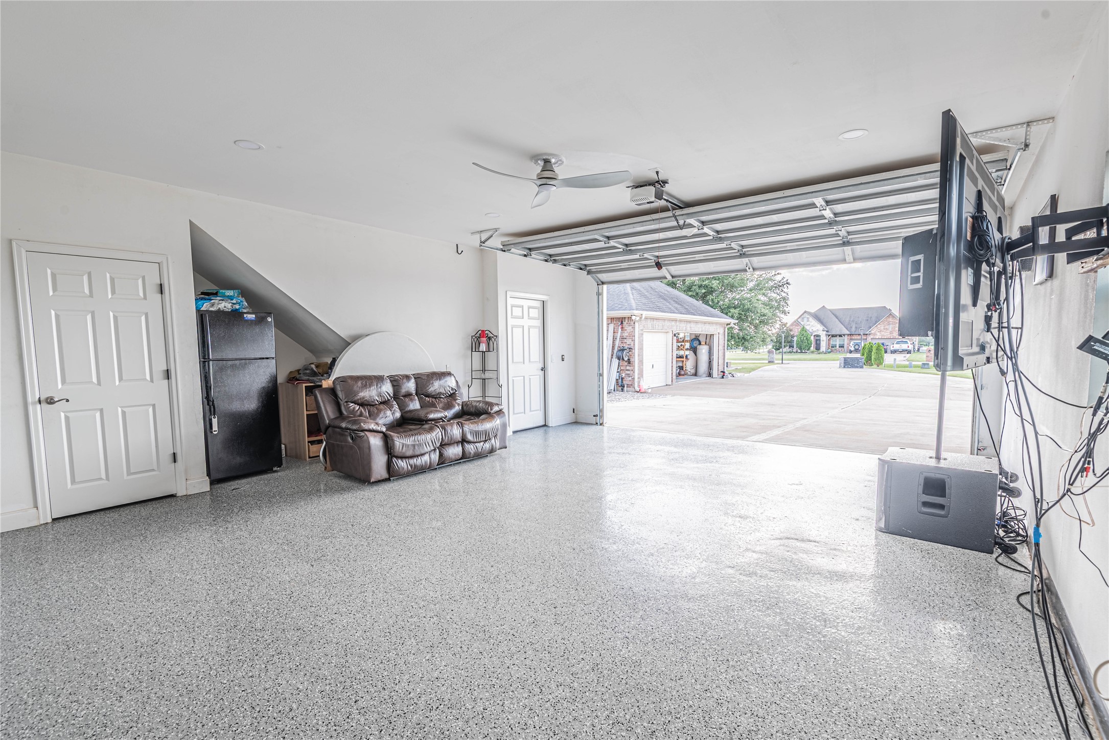 4702 Oasis Point Katy, TX 77493 - Photo 38 of 43 a view of a livingroom with furniture and a flat screen tv