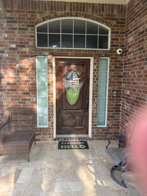 4702 Oasis Point Katy, TX 77493 - Photo 4 of 43 a front view of a house with a yard