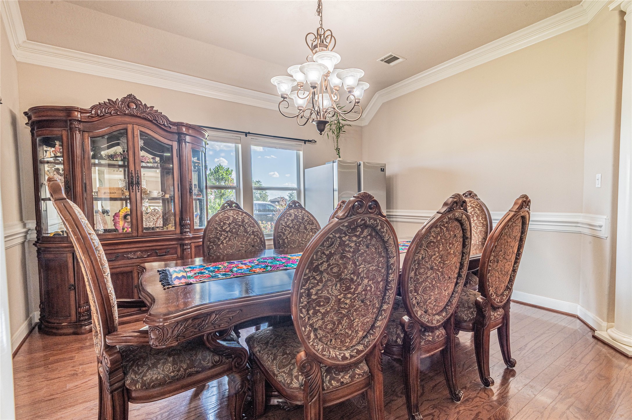 4702 Oasis Point Katy, TX 77493 - Photo 6 of 43 a view of a dining room with furniture window and wooden floor