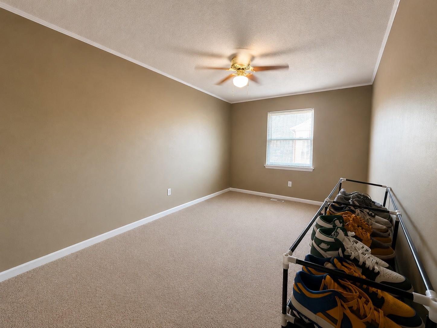 813 Thimbleberry Road, Unit 813 Baltimore, MD 21220 - Photo 18 of 32 Bedroom 2: Spacious room with natural light.