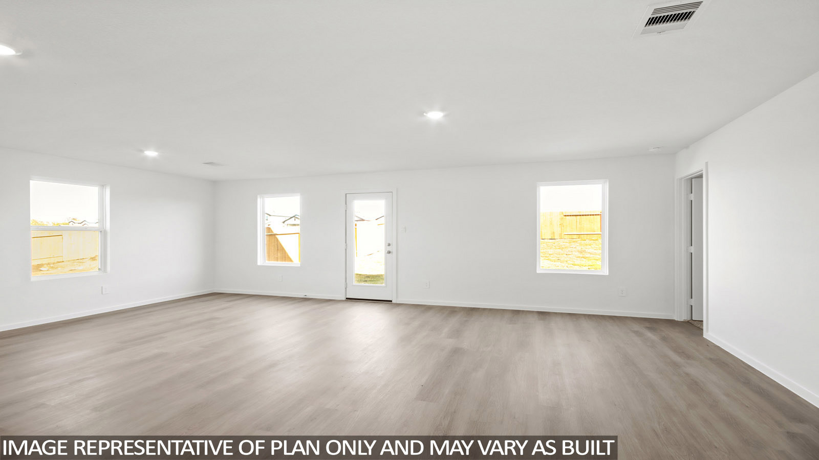 144 Baby Calf Roping Road Jarrell, TX 76537 - Photo 6 of 20 an empty room with a window and wooden floor