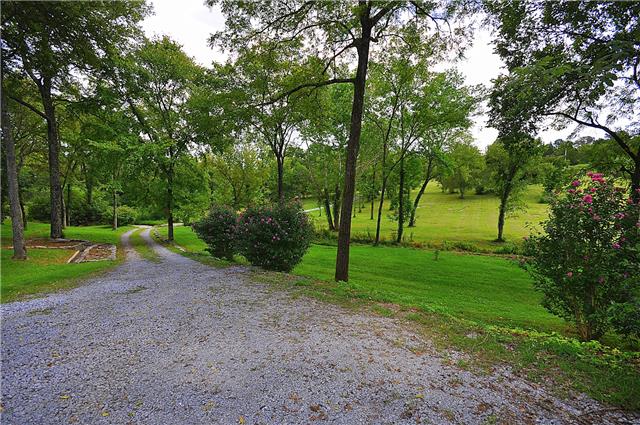 440 Bell Road Watertown, TN 37184 - Photo 15 of 16 a view of a park with large trees