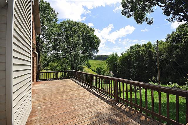 440 Bell Road Watertown, TN 37184 - Photo 16 of 16 a view of balcony with wooden floor and fence