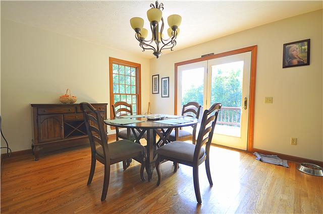 440 Bell Road Watertown, TN 37184 - Photo 3 of 16 a view of a dining room with furniture window and wooden floor