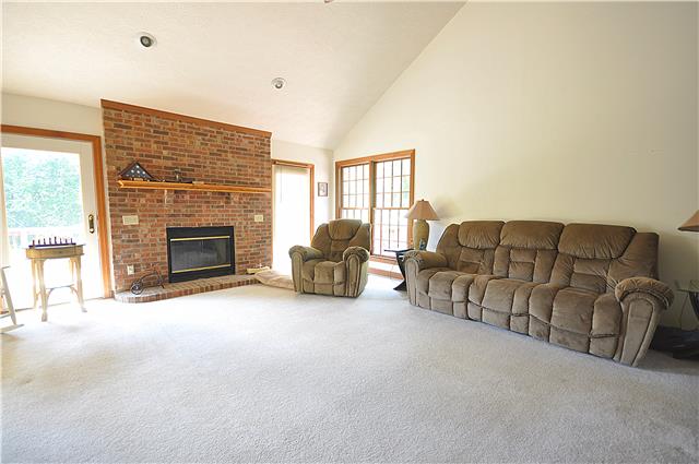 440 Bell Road Watertown, TN 37184 - Photo 6 of 16 a living room with furniture and a fireplace