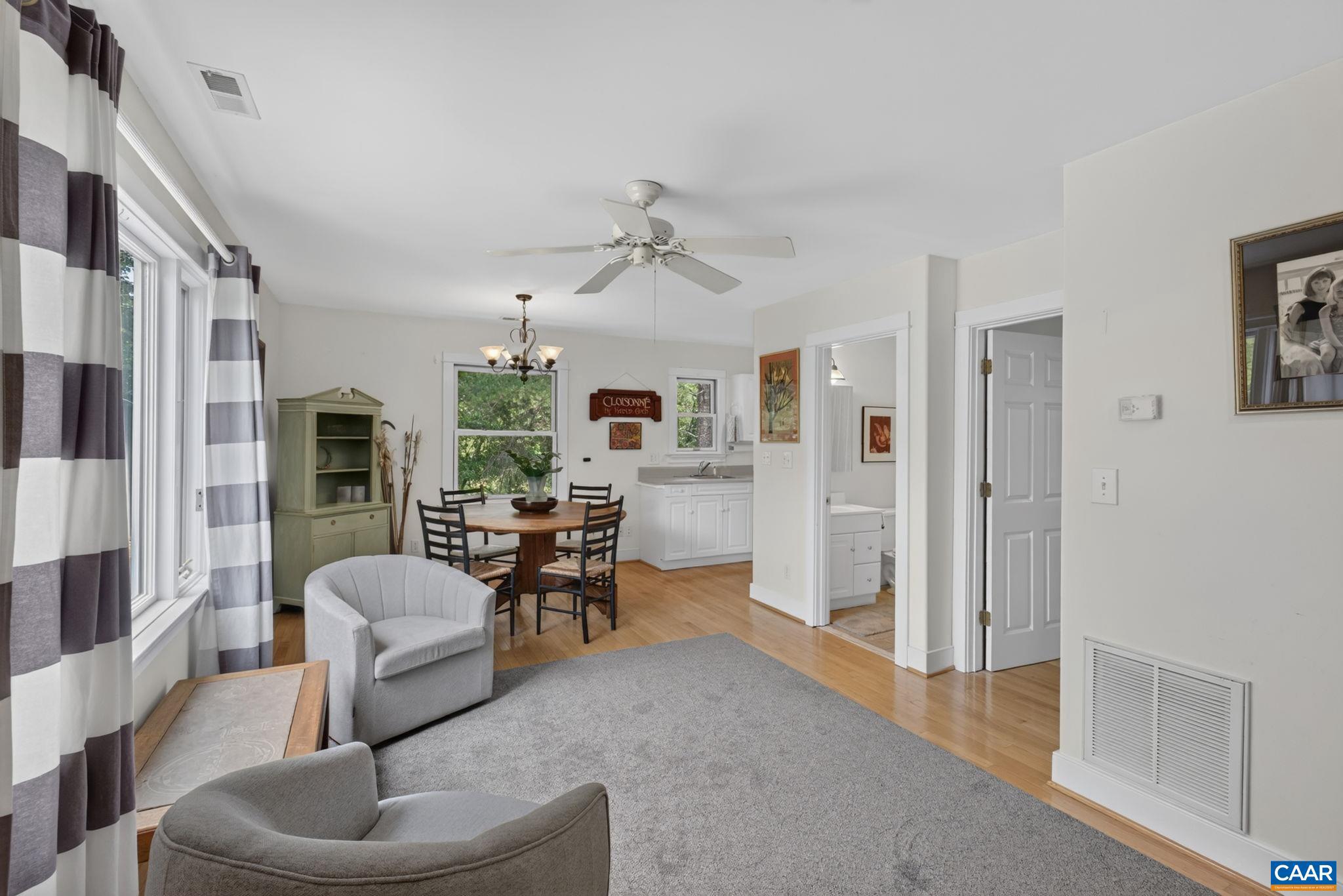 6285 Jarmans Gap Road Crozet, VA 22932 - Photo 29 of 65 a living room with furniture and a large window