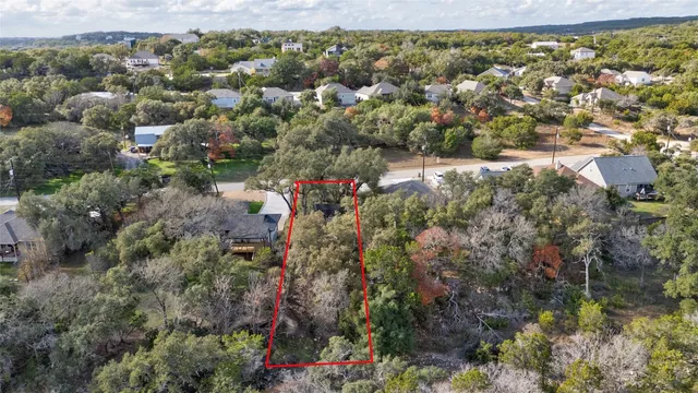 a view of a garden with houses