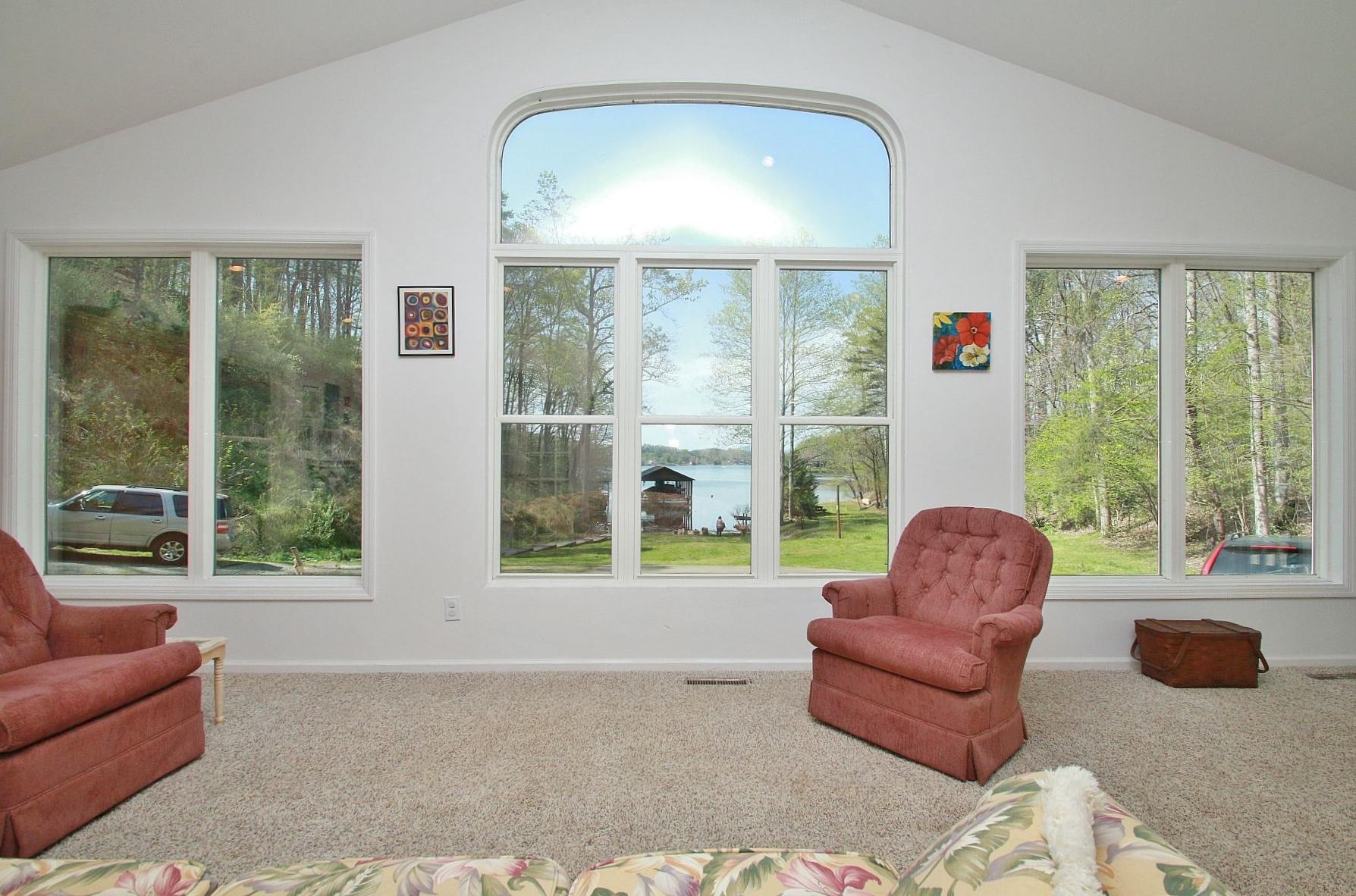 5965 Horseshoe Bend Road Goodview, VA 24095 - Photo 13 of 33 a living room with furniture and a window