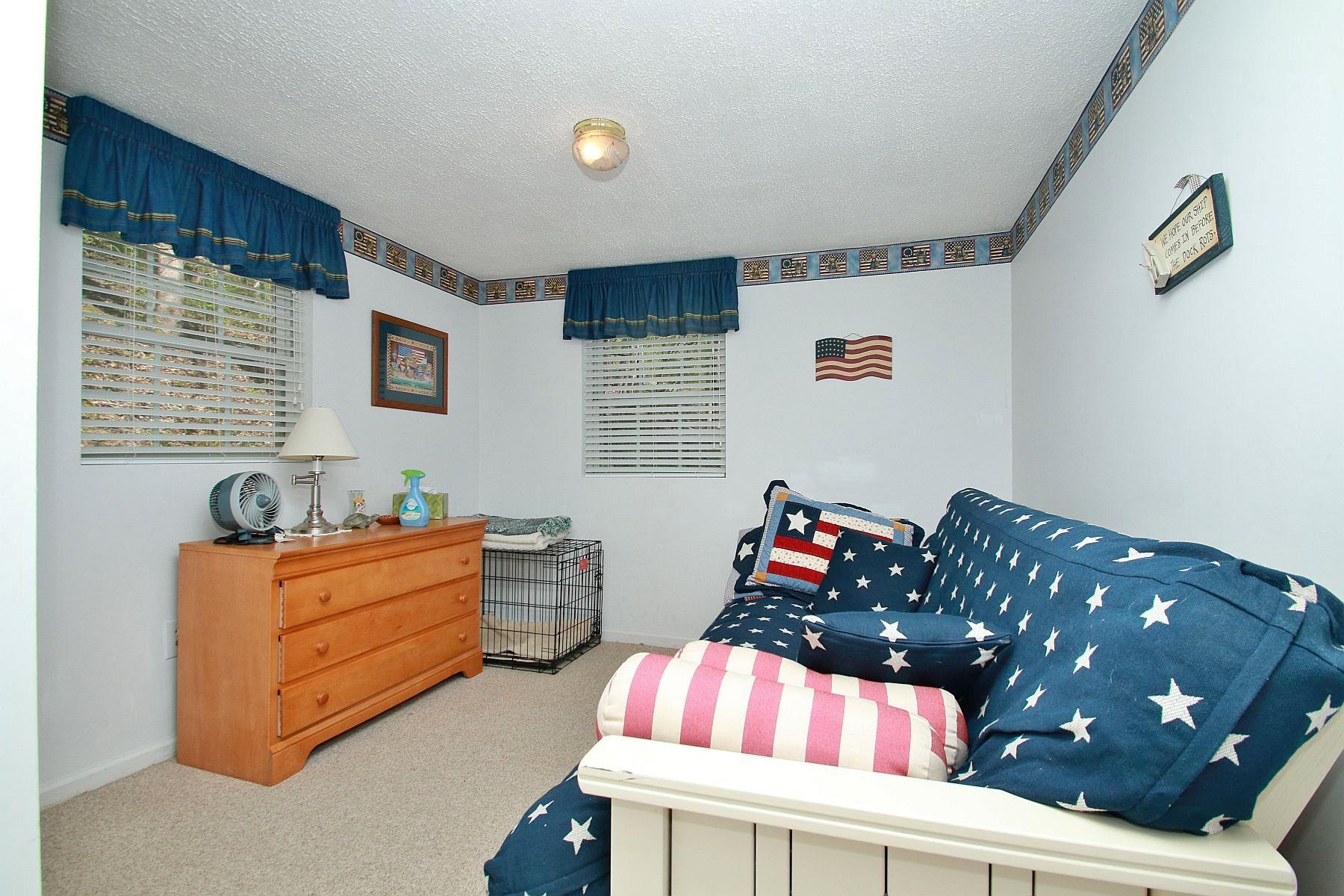 5965 Horseshoe Bend Road Goodview, VA 24095 - Photo 24 of 33 a living room with furniture and window